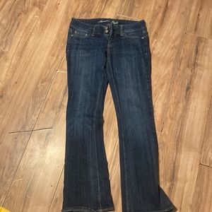 American eagle they are bellbottoms low waist and have a stretchy waist